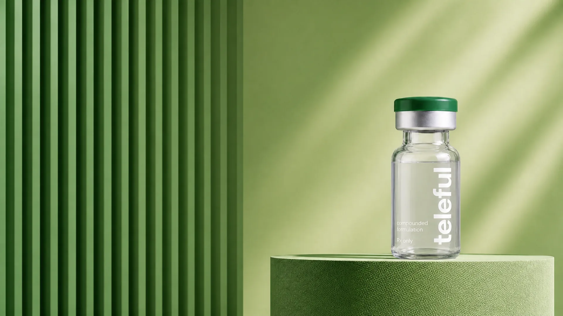 Teleful compounded formulation vial on a green podium